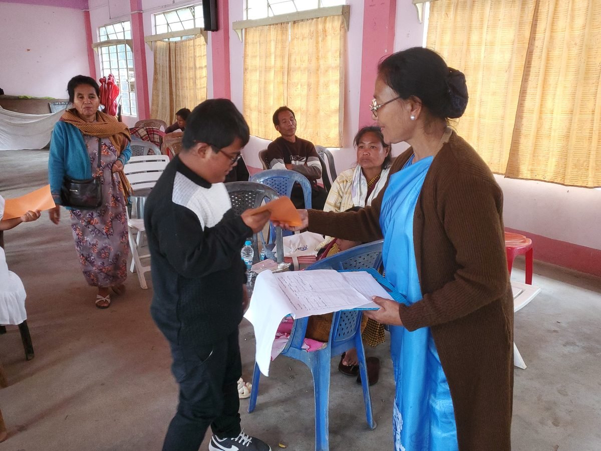Child receiving support from Aadya Foundation volunteer