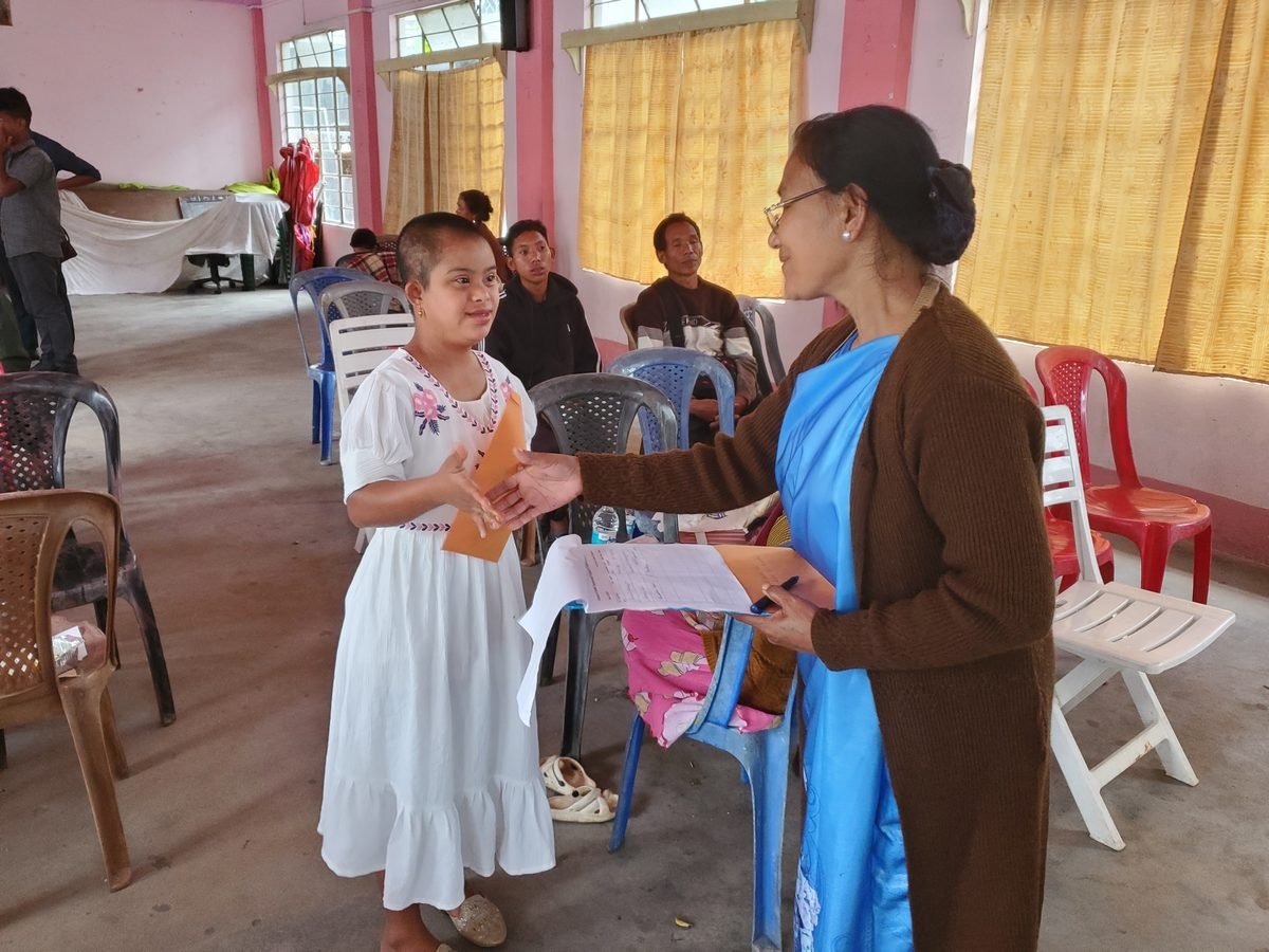 Child with Down syndrome at our rural camp