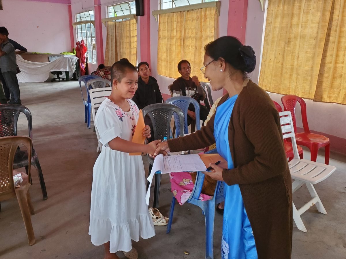 Child at the Aadya Foundation rural outreach event